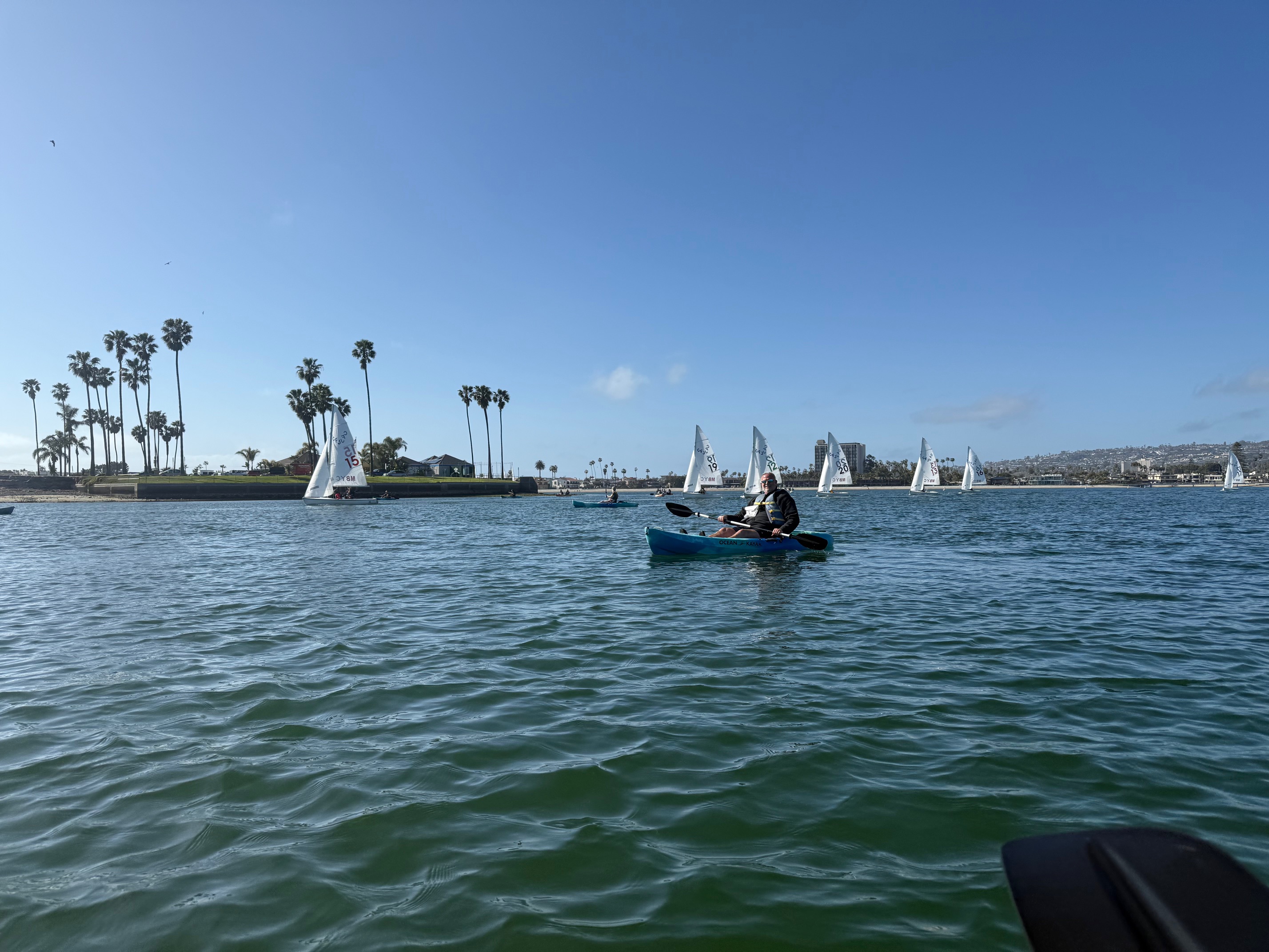 Kayaks and sail boats